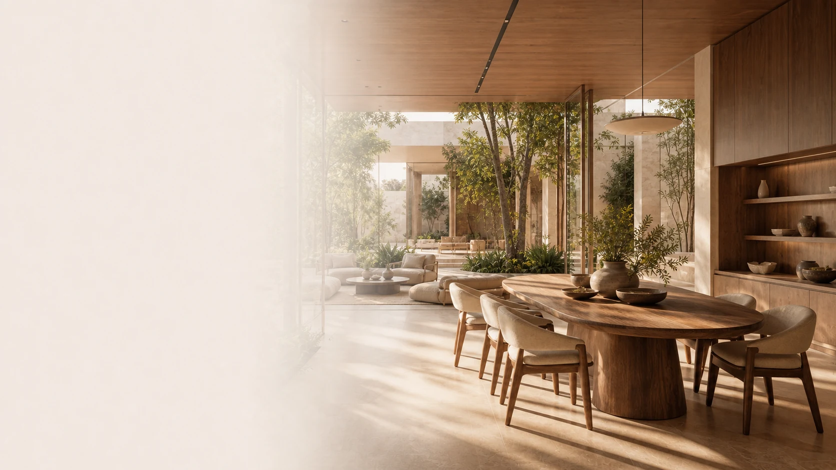 Warm timber dining pavilion beside an internal garden